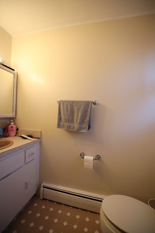 45 Assunta Road Revere, MA 02151 - Photo 18 of 19 a bathroom with a toilet and a sink