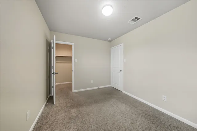 an empty room with an entryway