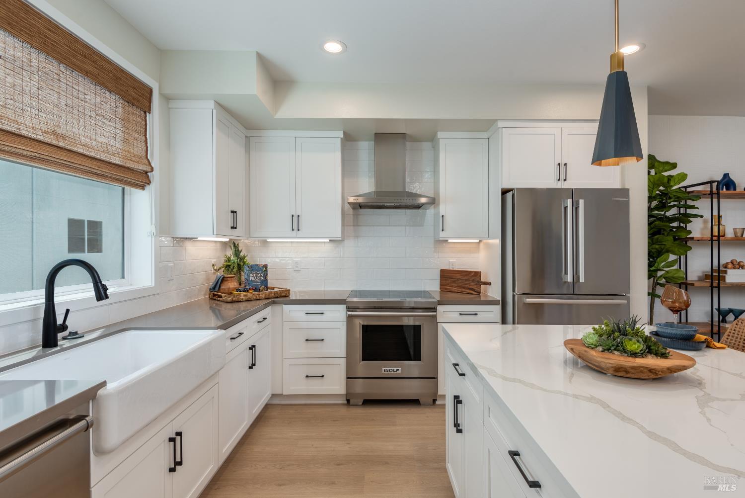 337 Montague Expressway Milpitas, CA 95035 - Photo 3 of 7 a kitchen with stainless steel appliances granite countertop a sink stove and refrigerator