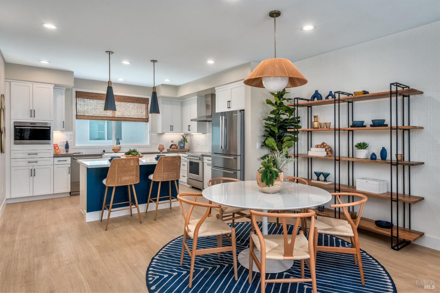 337 Montague Expressway Milpitas, CA 95035 - Photo 5 of 7 a view of a dining room with furniture and wooden floor