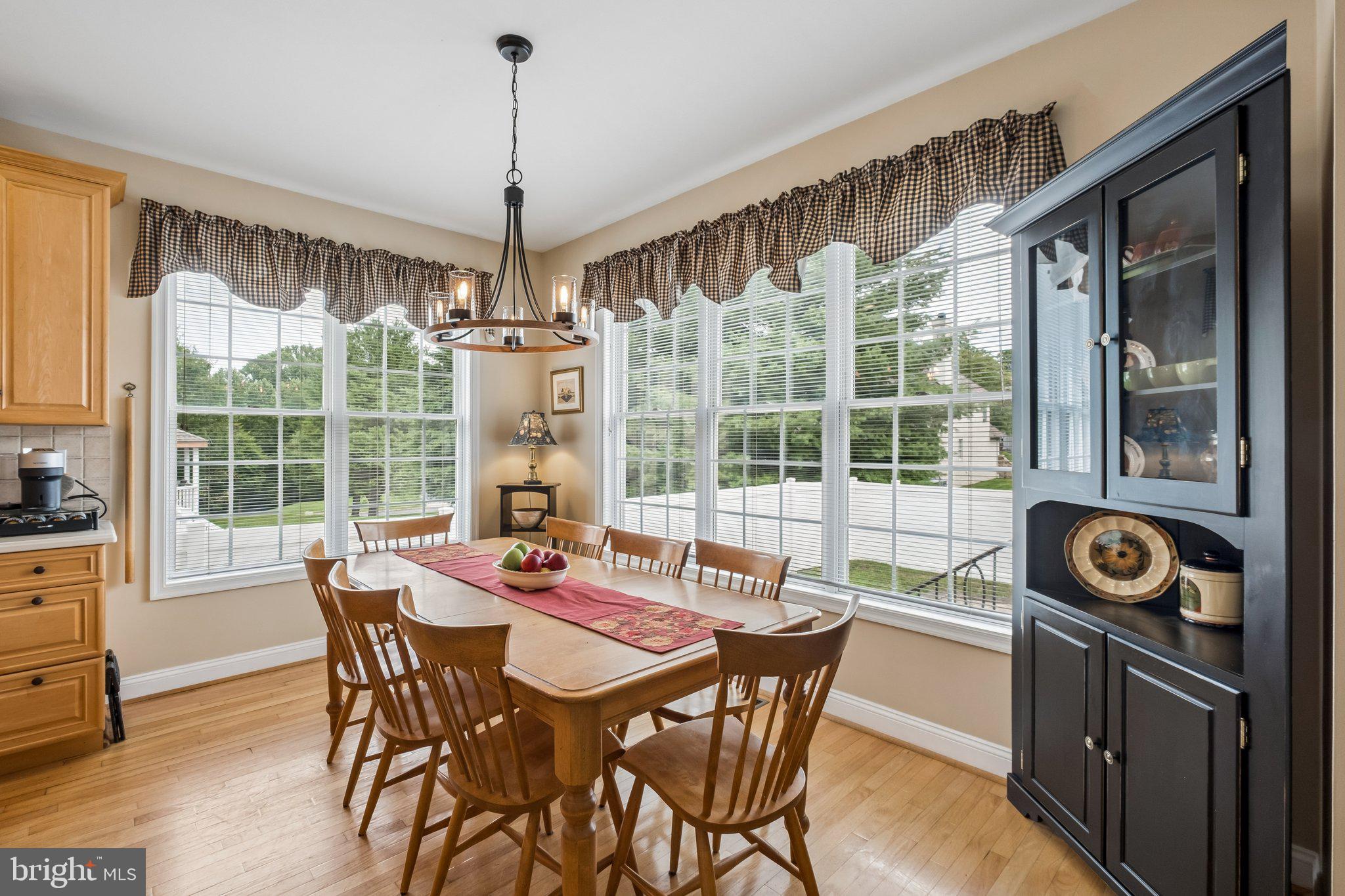 305 Langford Road Broomall, PA 19008 - Photo 16 of 83 a view of a dining room with furniture window and outside view