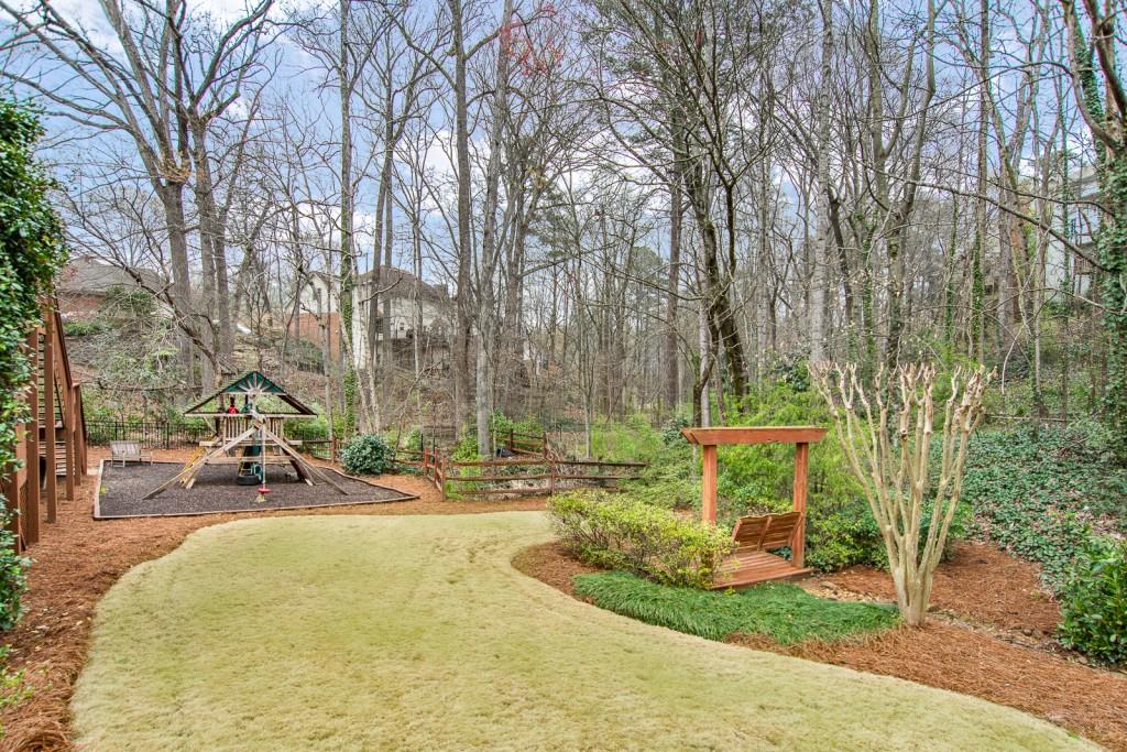 1106 Byrnwyck Road Northeast Brookhaven, GA 30319 - Photo 23 of 41 a view of a park with large trees