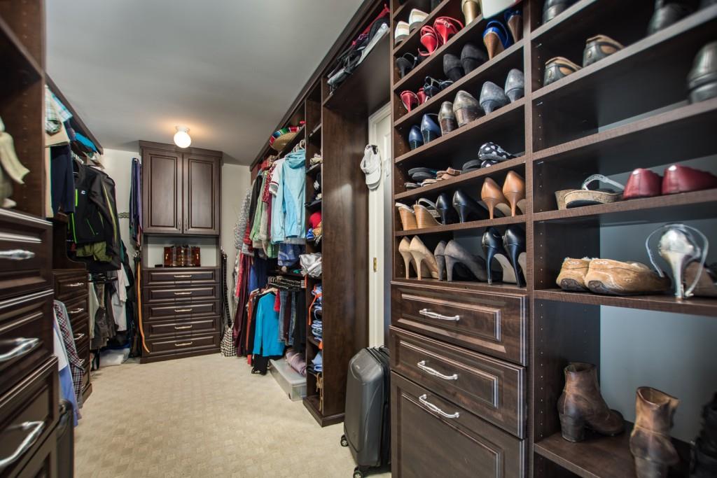 1106 Byrnwyck Road Northeast Brookhaven, GA 30319 - Photo 32 of 41 a view of walk in closet with clothes and shoes