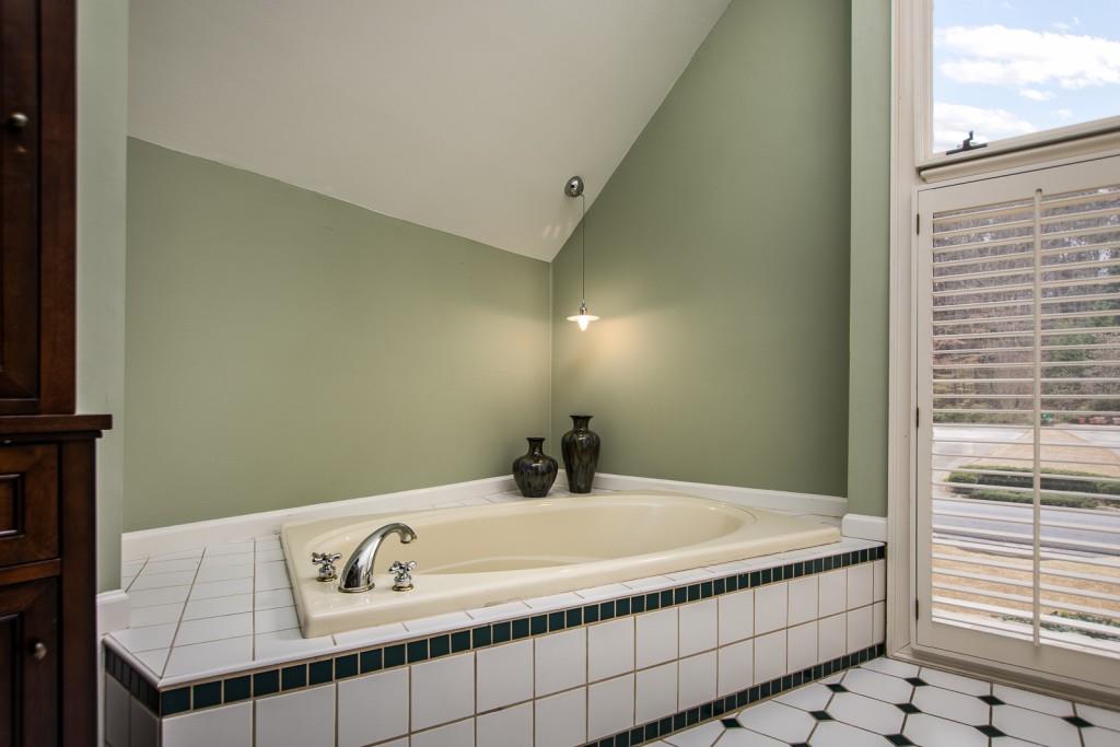 1106 Byrnwyck Road Northeast Brookhaven, GA 30319 - Photo 33 of 41 a bathroom with a sink and a window