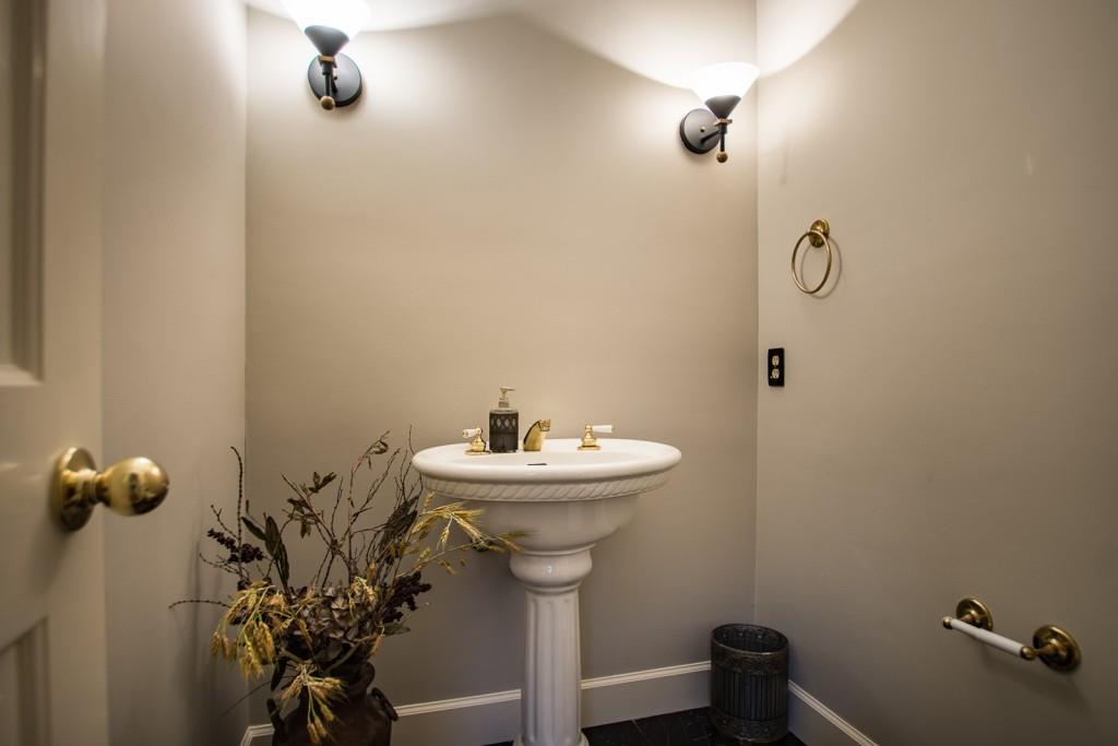 1106 Byrnwyck Road Northeast Brookhaven, GA 30319 - Photo 9 of 41 a bathroom with a sink mirror and toilet