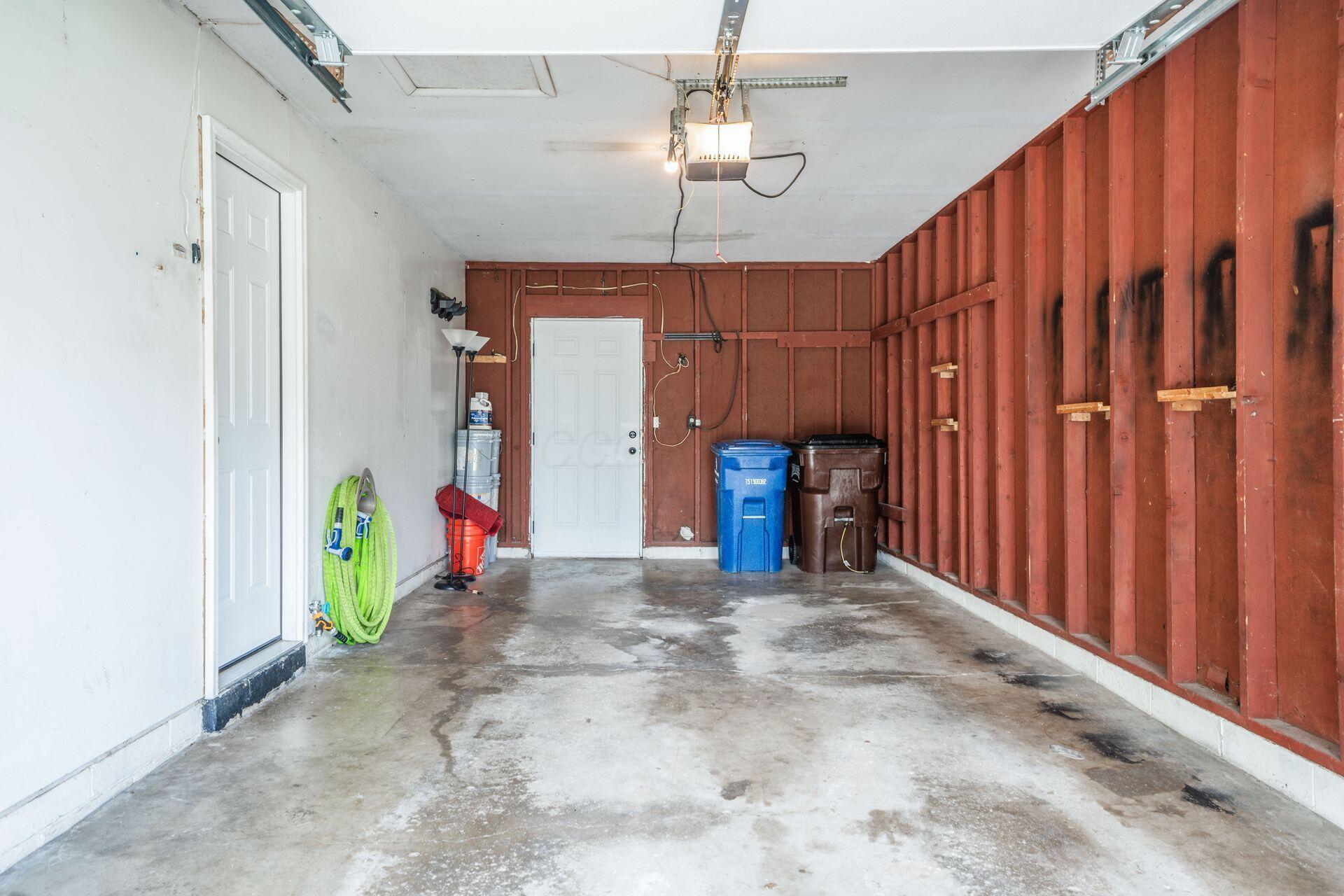 3464 Brazzaville Road Westerville, OH 43081 - Photo 46 of 46 Very deep garage for additional storage and door to back yard