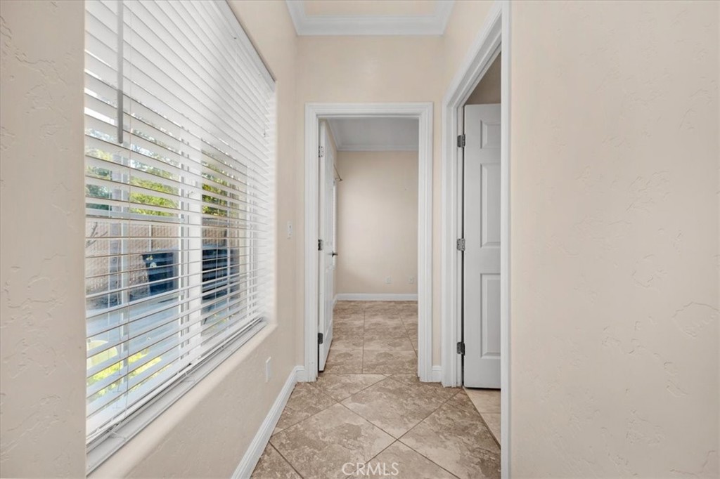 3271 East Muscat Avenue Fresno, CA 93725 - Photo 12 of 53 a view of a room with windows