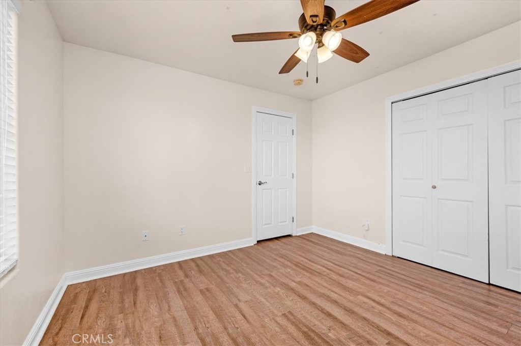 3271 East Muscat Avenue Fresno, CA 93725 - Photo 25 of 53 wooden floor in an empty room