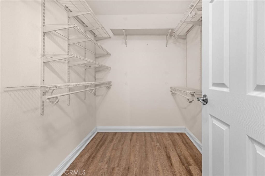 3271 East Muscat Avenue Fresno, CA 93725 - Photo 35 of 53 a view of walk in closet with empty racks