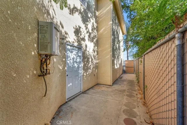 a view of a house with a street
