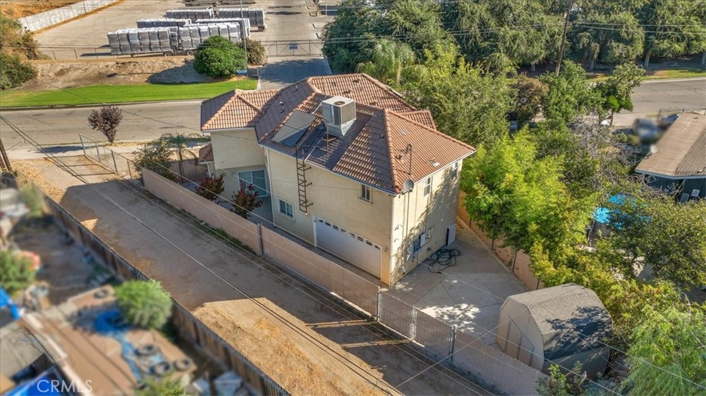 3271 East Muscat Avenue Fresno, CA 93725 - Photo 48 of 53 a view of a house with a yard
