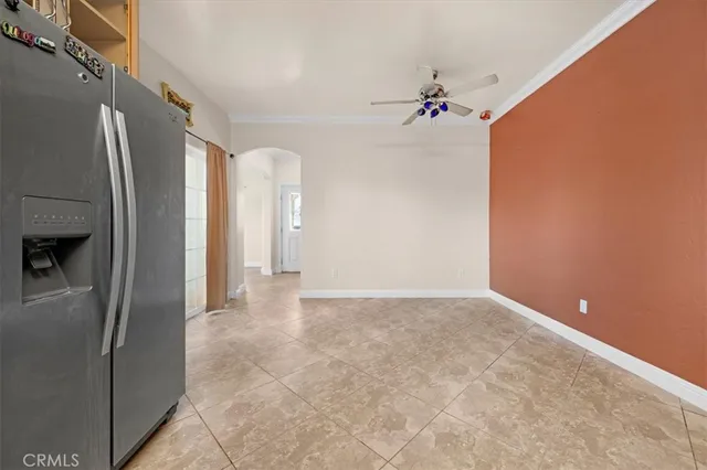 a view of a refrigerator in a kitchen