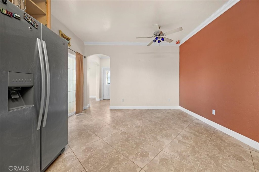 3271 East Muscat Avenue Fresno, CA 93725 - Photo 6 of 53 a view of a refrigerator in a kitchen