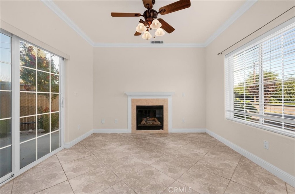 3271 East Muscat Avenue Fresno, CA 93725 - Photo 8 of 53 a view of an empty room with a window