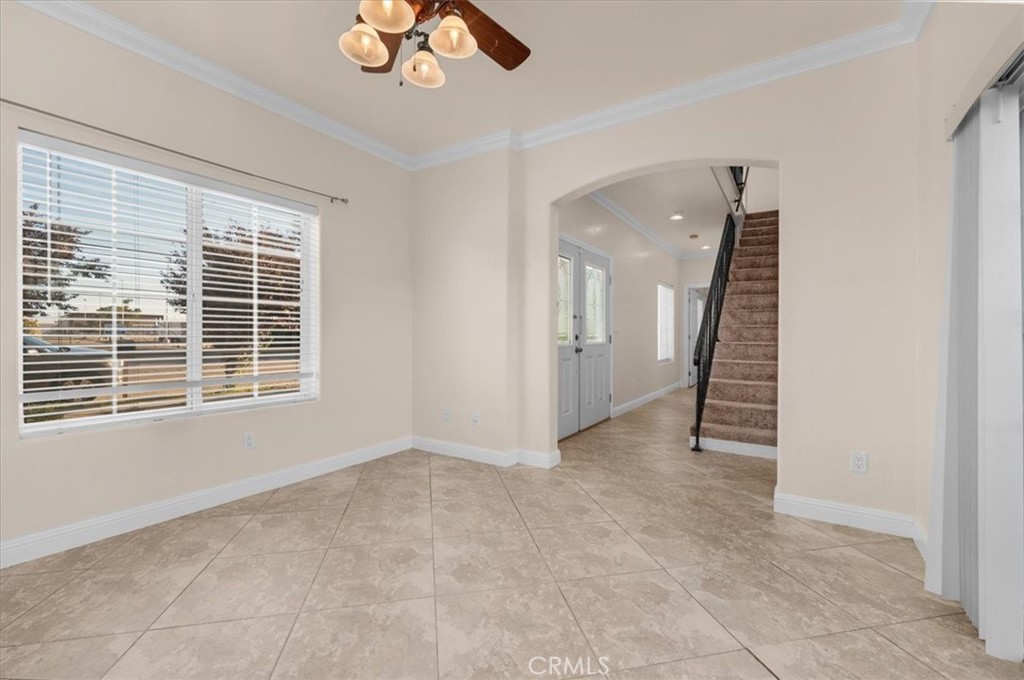 3271 East Muscat Avenue Fresno, CA 93725 - Photo 10 of 53 a view of an empty room with a window