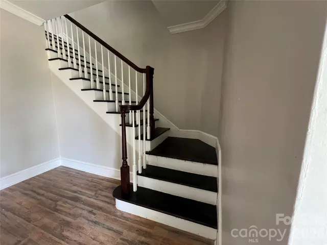 a view of entryway with wooden floor