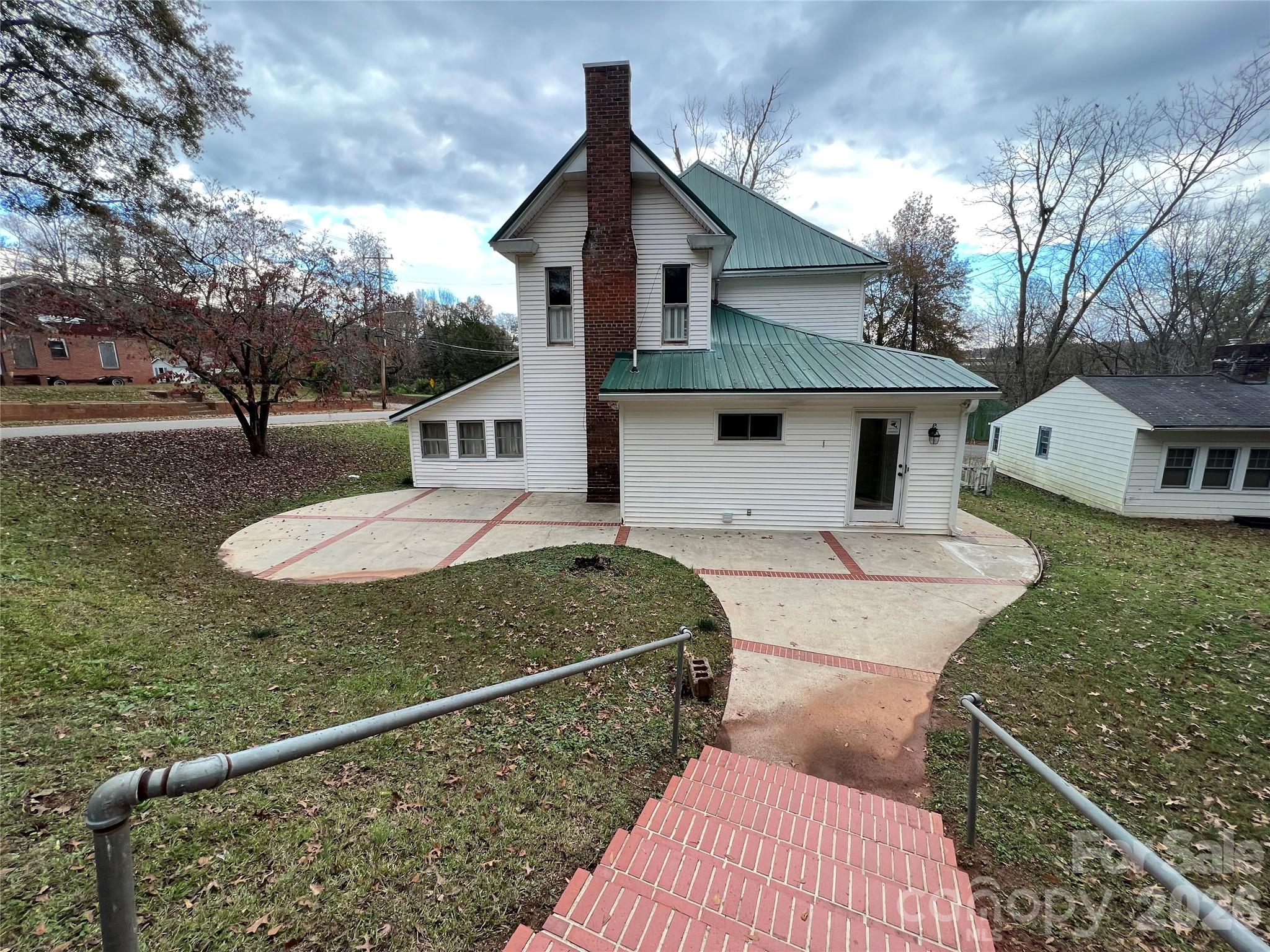 171 North Mitchell Street Rutherfordton, NC 28139 - Photo 2 of 29 a view of a house with backyard