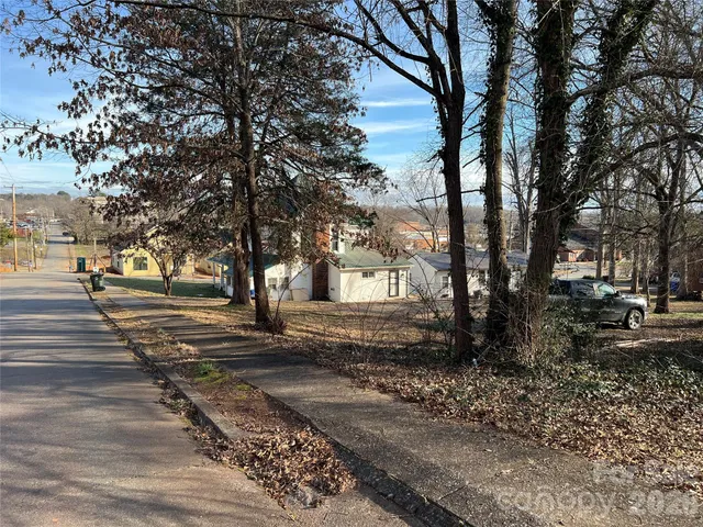 a view of park with tree s