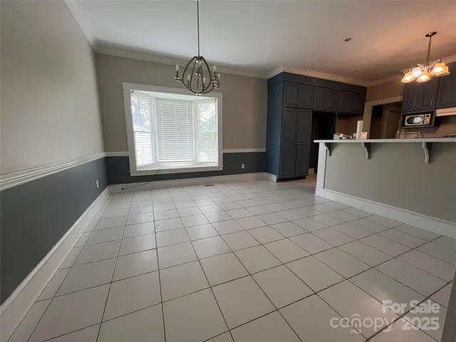 a view of kitchen and windows