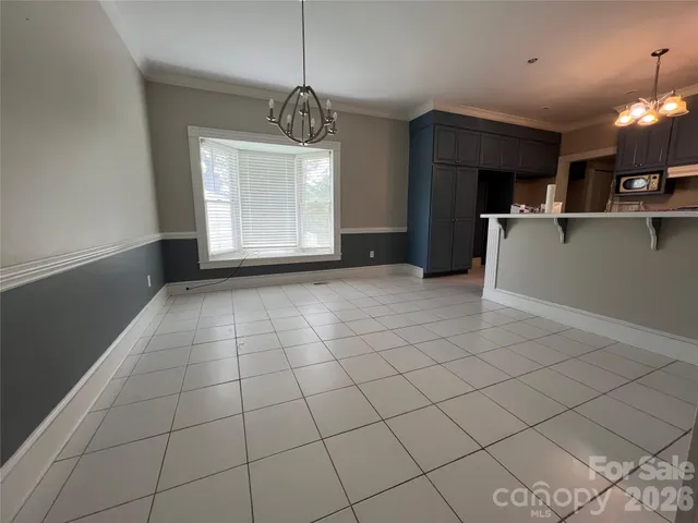 a view of kitchen and windows