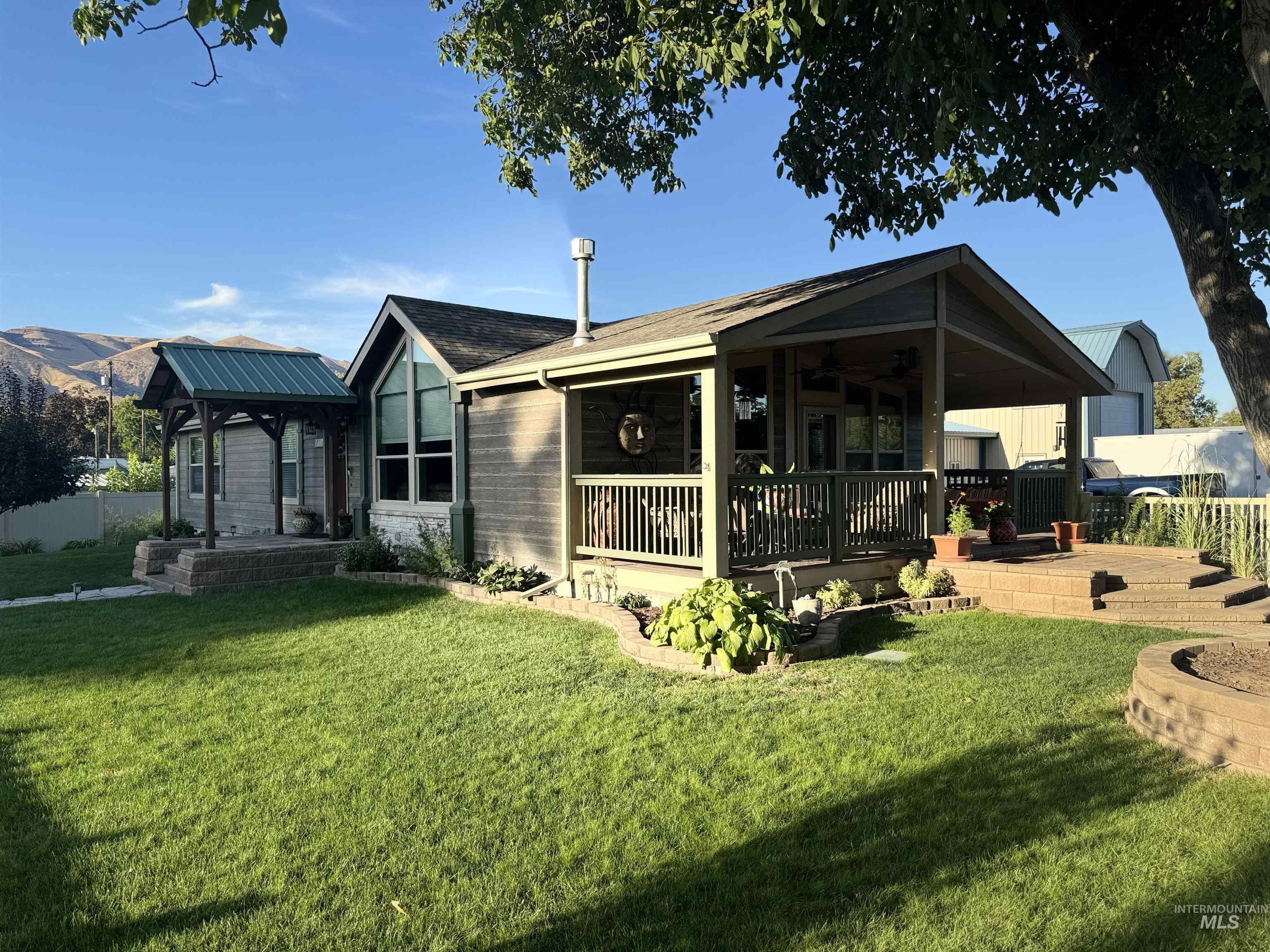 811 14th Street Clarkston, WA 99403 - Photo 32 of 50 View of front facade featuring a ceiling fan and roof with shingles
