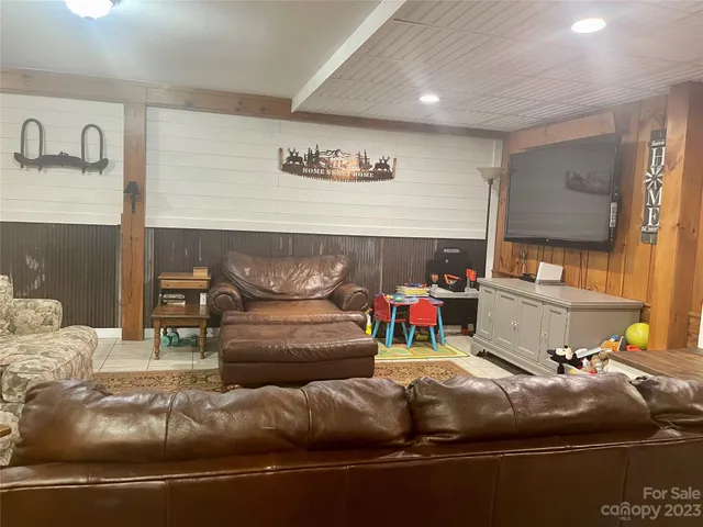 a living room with furniture and a couch