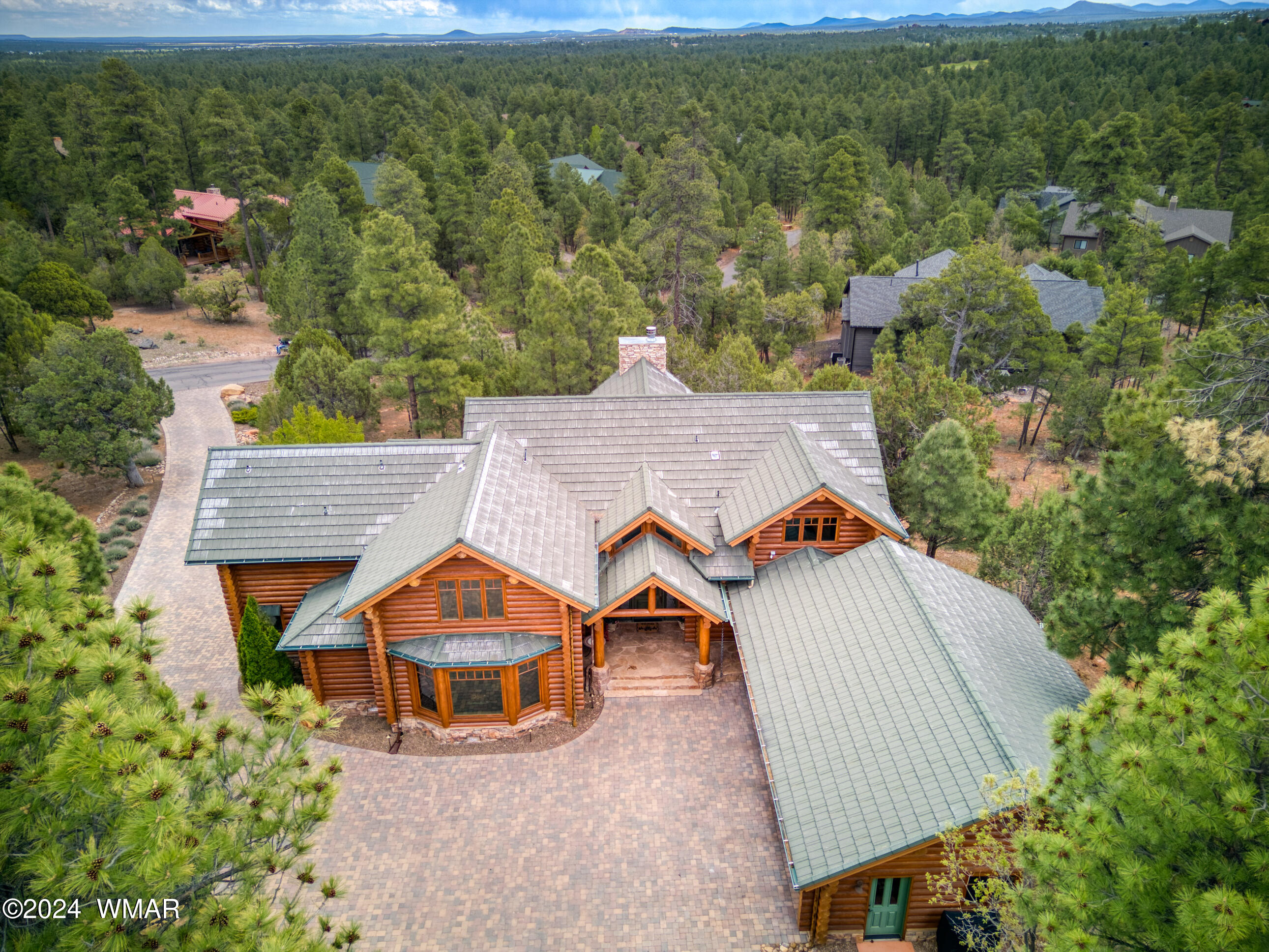 4281 Shaggy Bark Road Show Low, AZ 85901 - Photo 1 of 84 an aerial view of a house with a yard and lake view