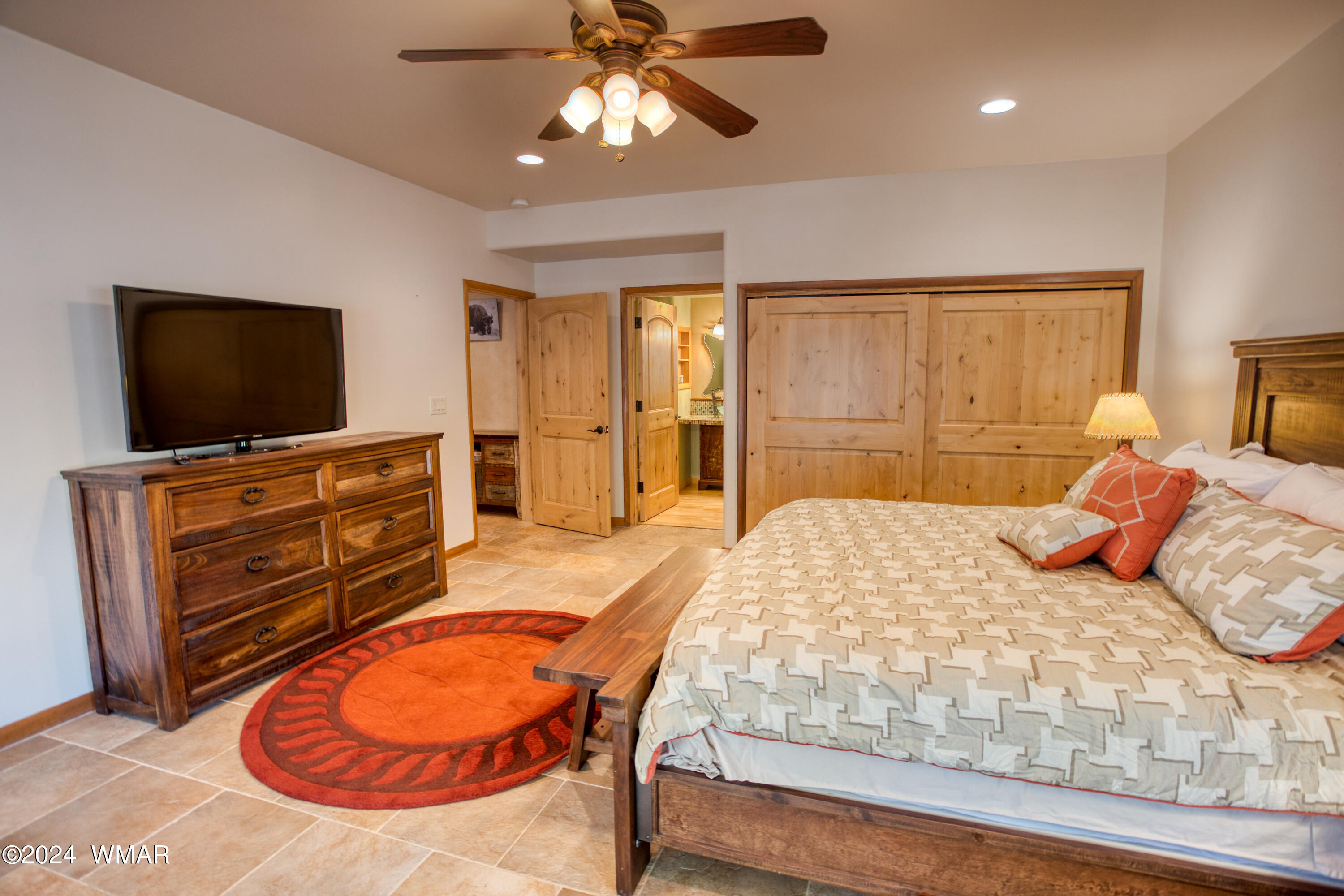 4281 Shaggy Bark Road Show Low, AZ 85901 - Photo 53 of 84 a bedroom with a bed and wooden floor