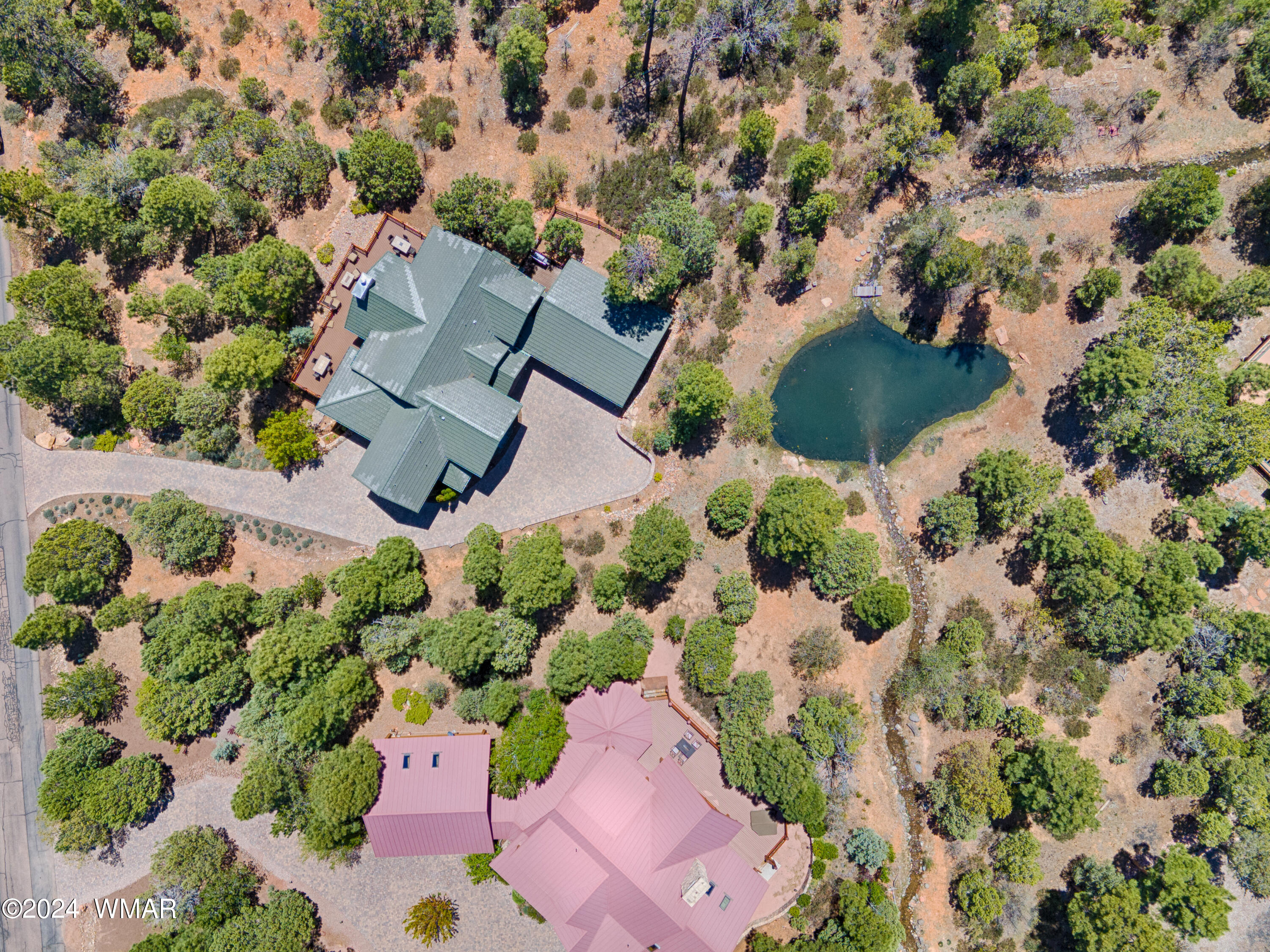 4281 Shaggy Bark Road Show Low, AZ 85901 - Photo 68 of 84 an aerial view of a house with a yard