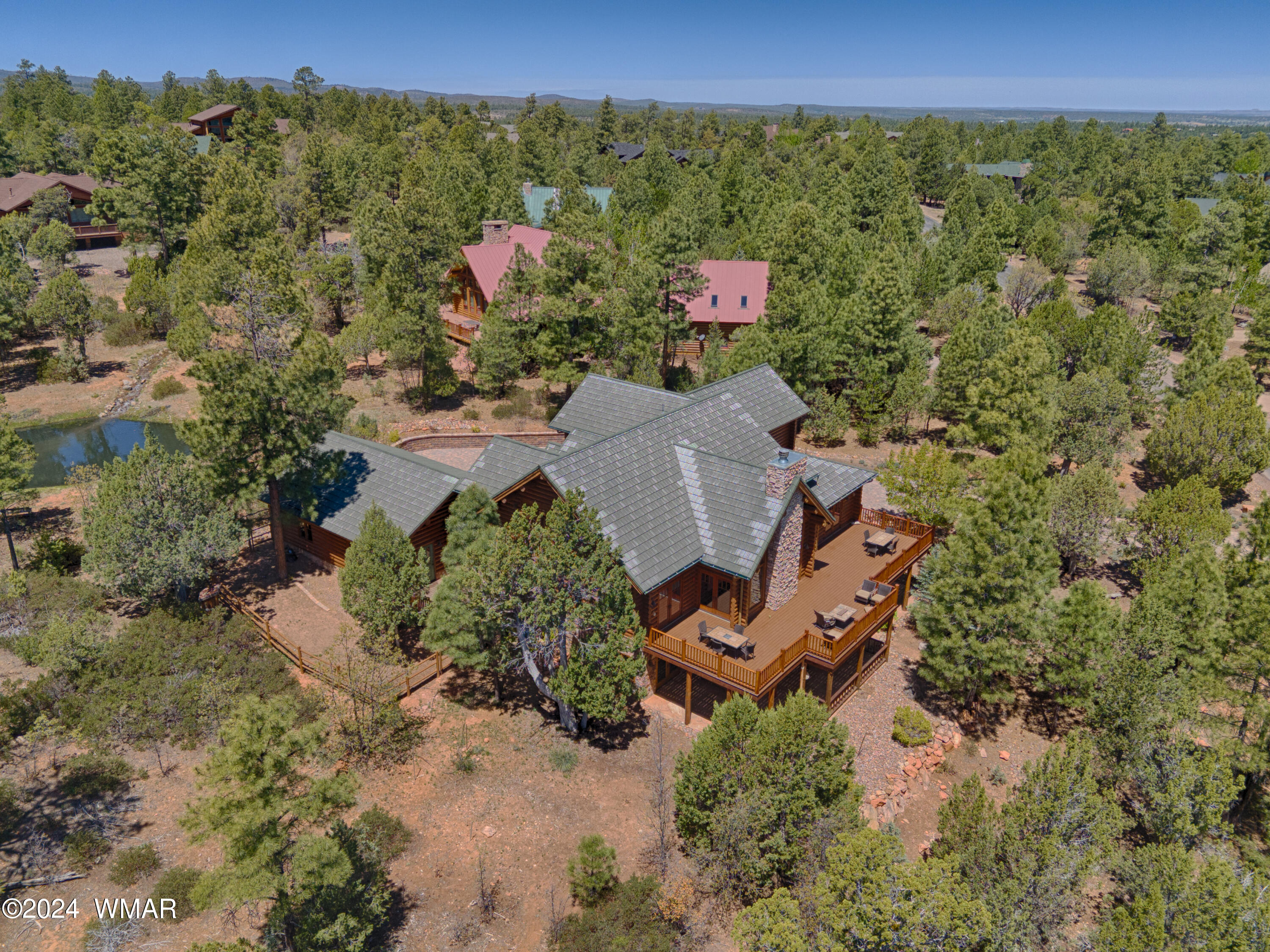 4281 Shaggy Bark Road Show Low, AZ 85901 - Photo 69 of 84 an aerial view of a house with mountain view