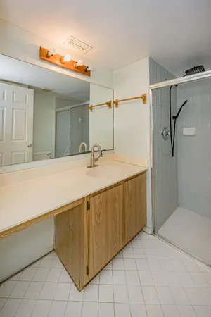 a bathroom with a sink and mirror