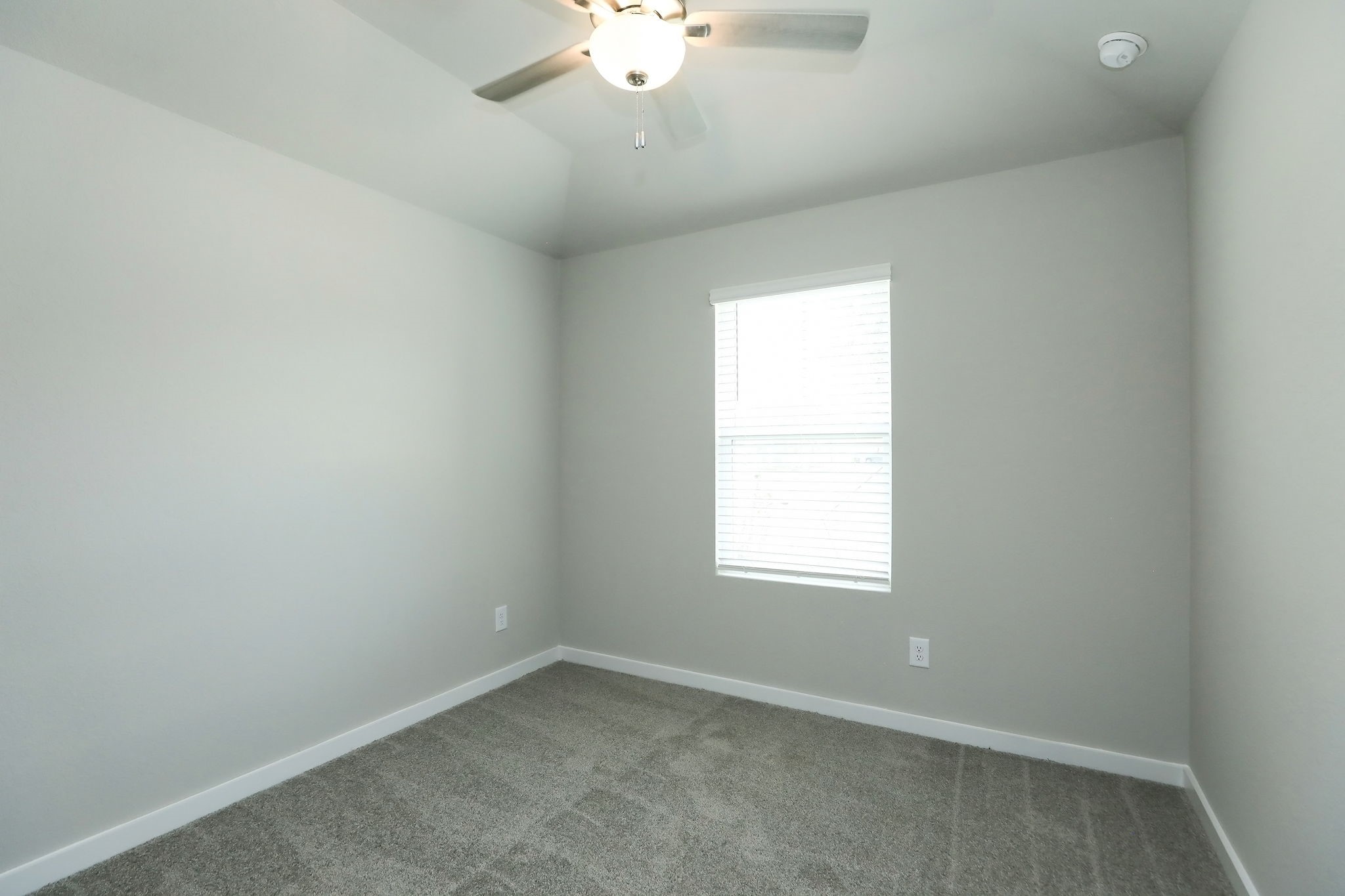 14110 Greystone Ter Street Magnolia, TX 77354 - Photo 16 of 34 Secondary Bedroom #3 Is Located In The Front Of The Home, Just Off The Front Entry. Please Note That The Window Treatments In Each Room Are Modern Push/Pull 2" Blinds, Eliminating The Need For Unattractive And Potentially Dangerous Draw Strings.