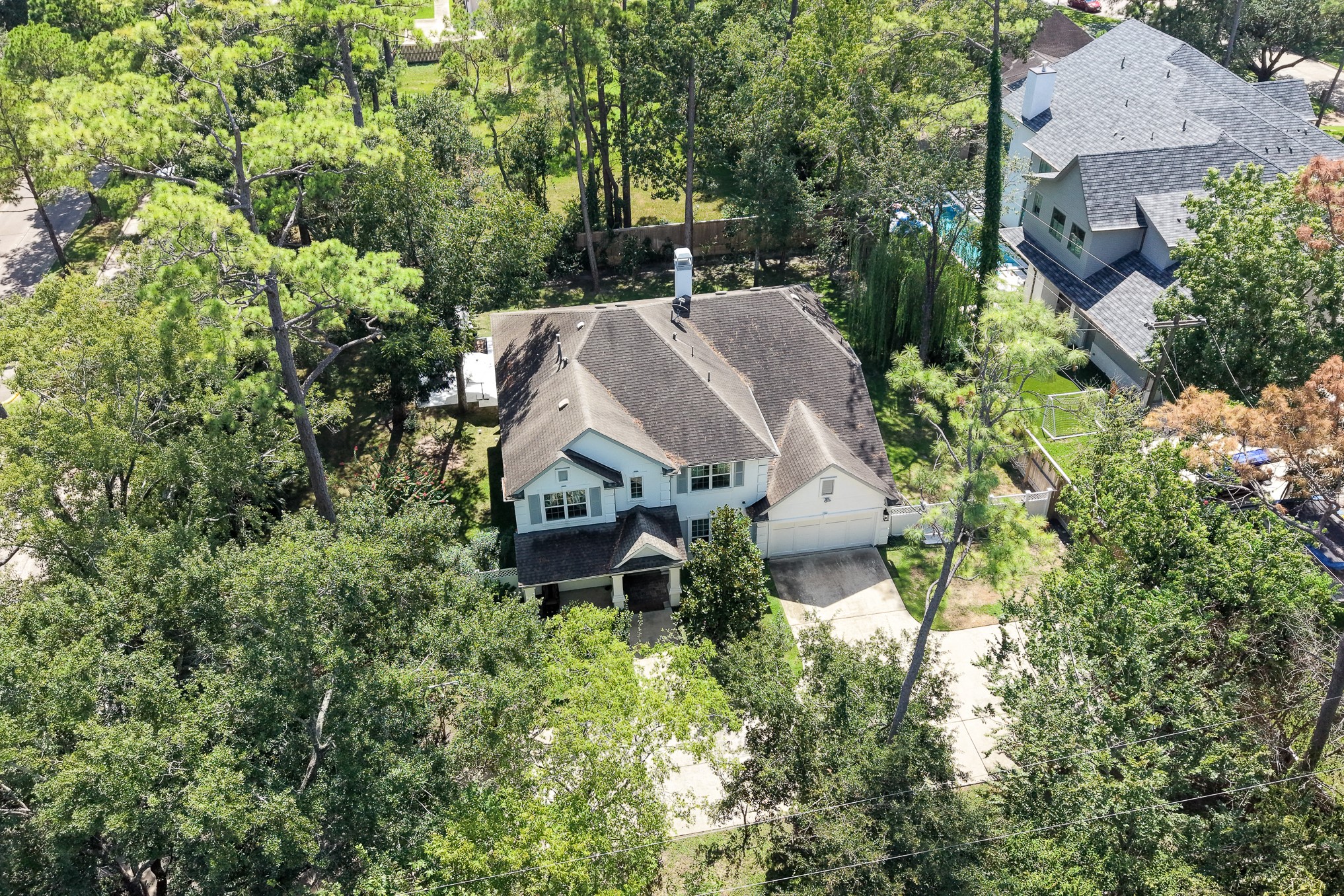 335 Voss Road Houston, TX 77024 - Photo 45 of 50 Private retreat nestled among secular and pine trees in an exclusive enclave.