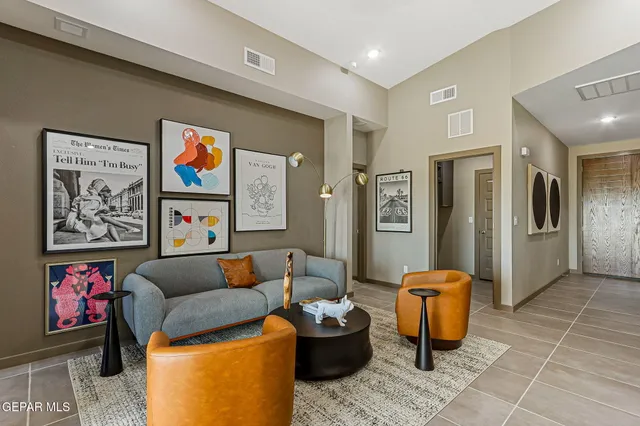 a living room with furniture and a couch