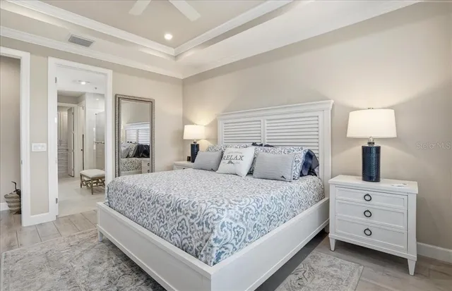 a view of a workspace with furniture and wooden floor