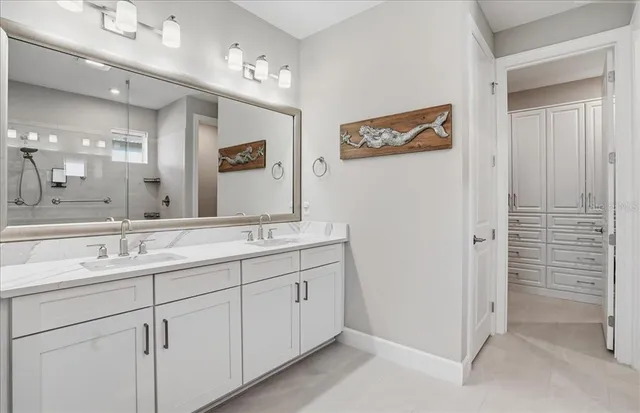 a bedroom with a bed and a tv