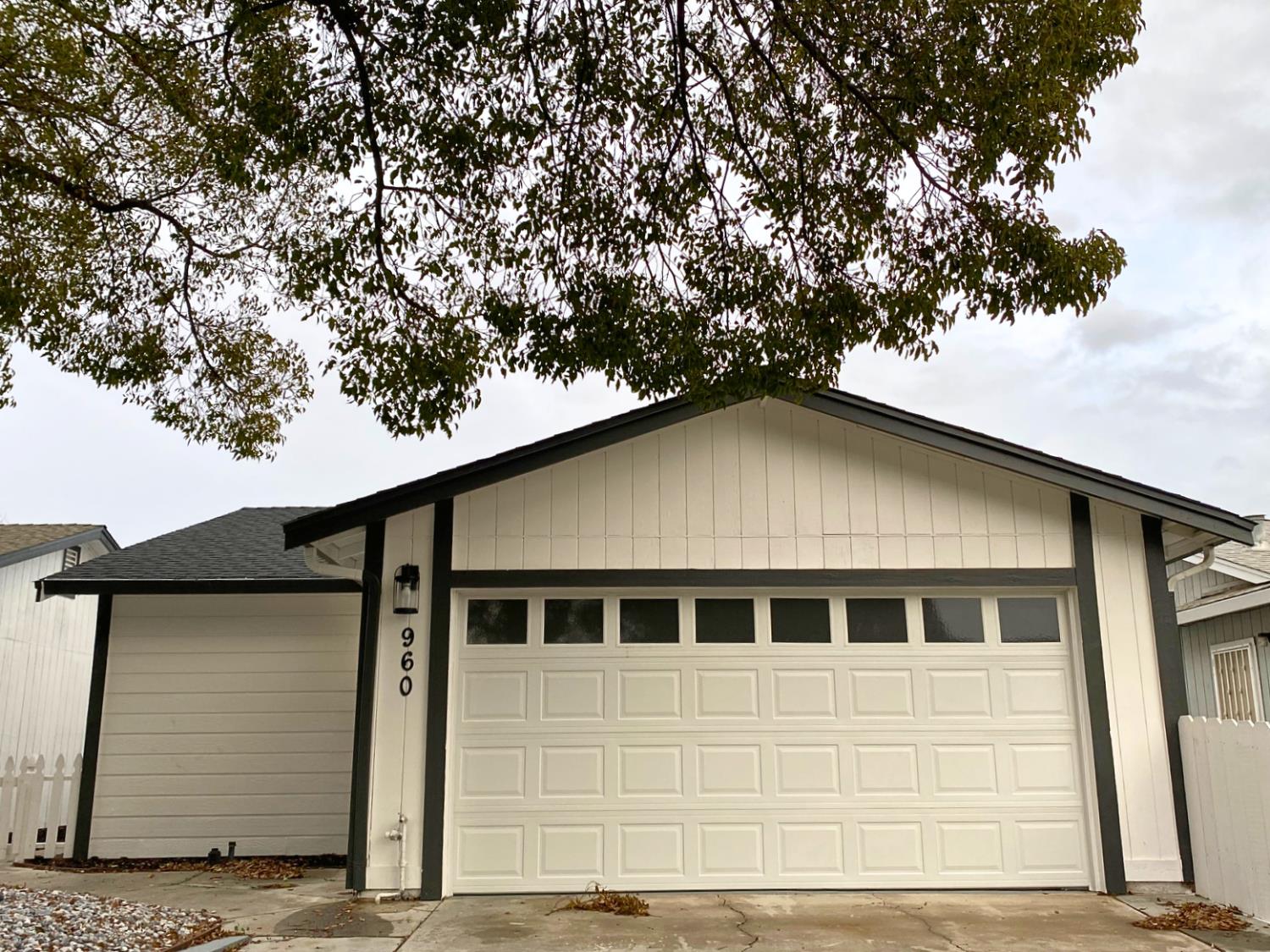 a house with trees in the background