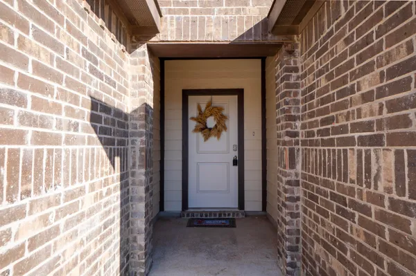 a front view of a house with a door