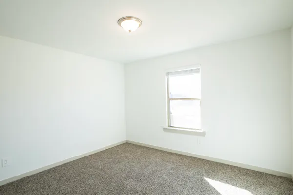 an empty room with a window