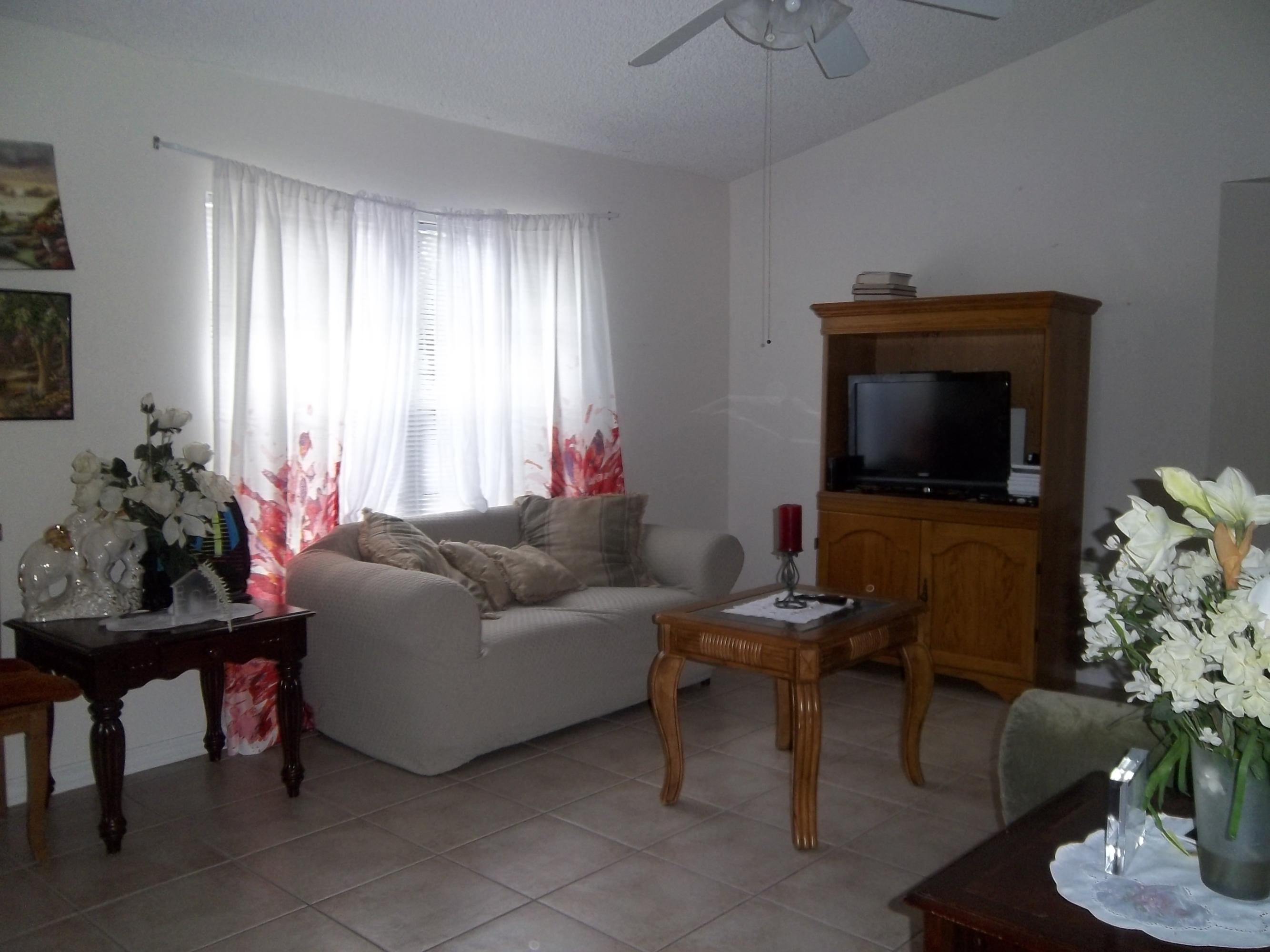 638 Southwest Homeland Road Port St. Lucie, FL 34953 - Photo 2 of 5 Living Room