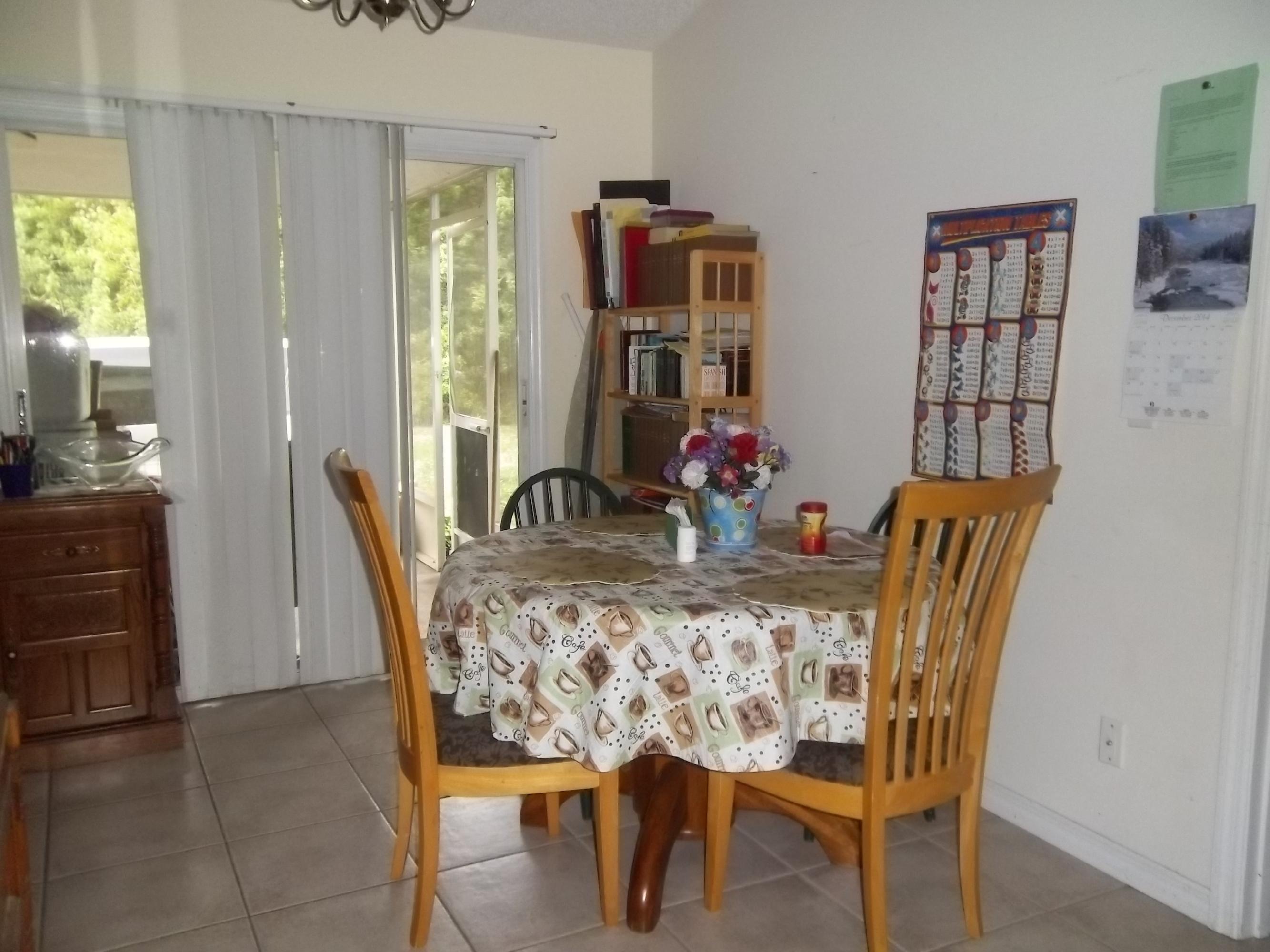 638 Southwest Homeland Road Port St. Lucie, FL 34953 - Photo 3 of 5 DINING ROOM