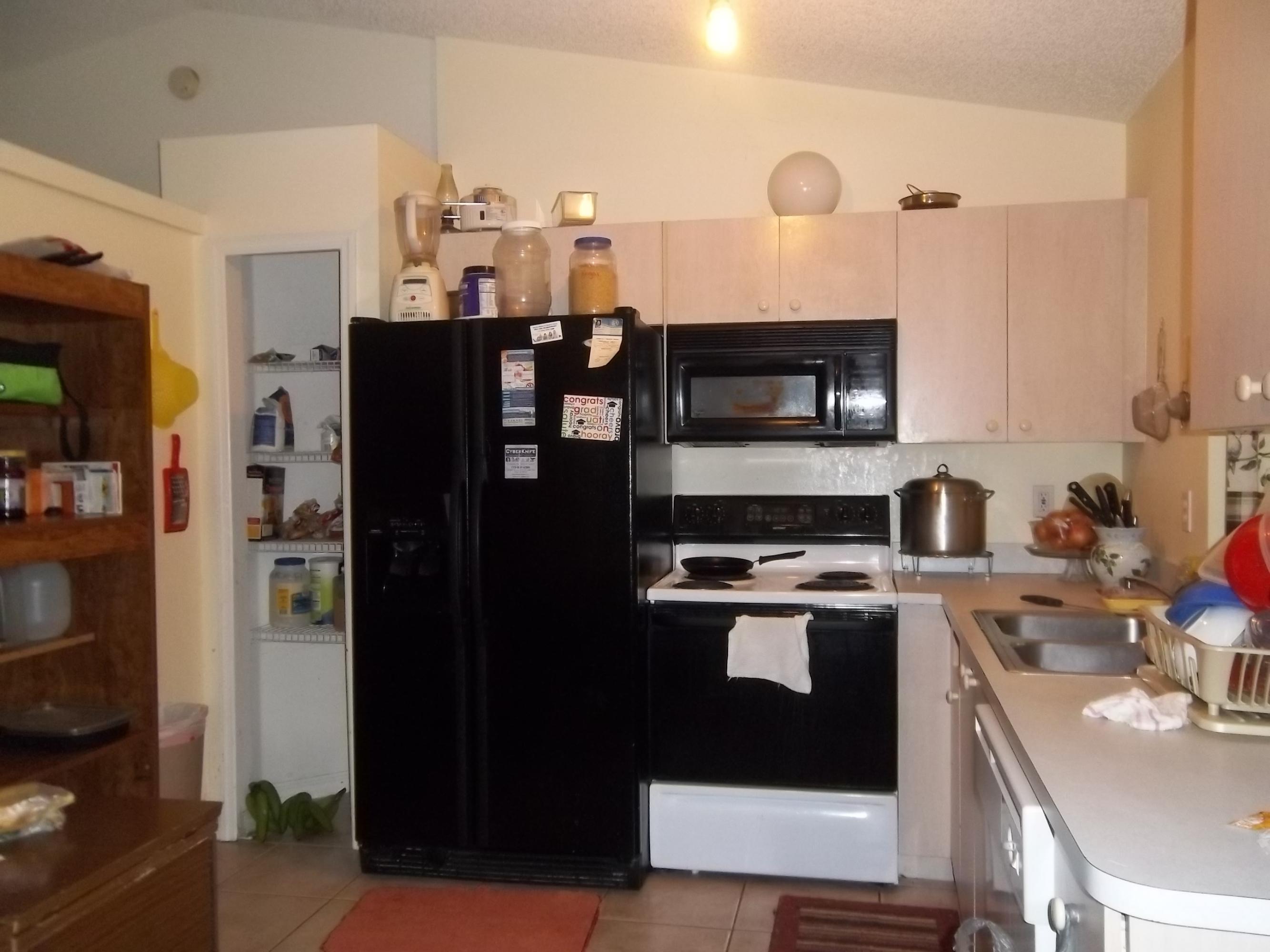 638 Southwest Homeland Road Port St. Lucie, FL 34953 - Photo 4 of 5 Kitchen