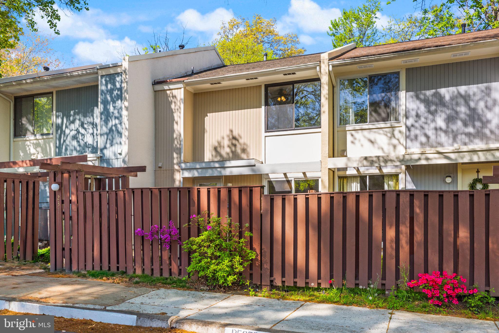 a front view of a house having yard