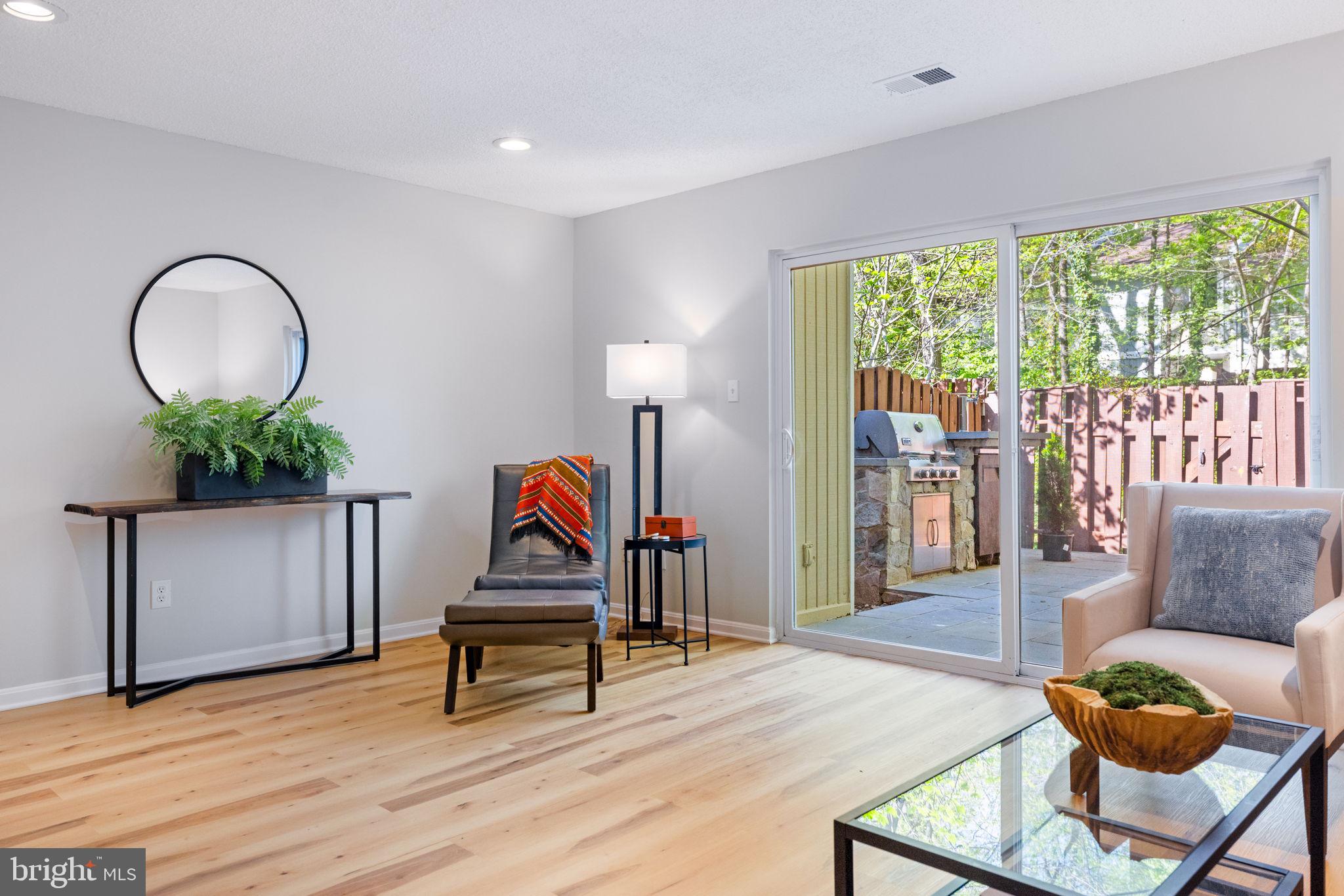 2389 Southgate Square Reston, VA 20191 - Photo 21 of 56 a living room with furniture and wooden floor