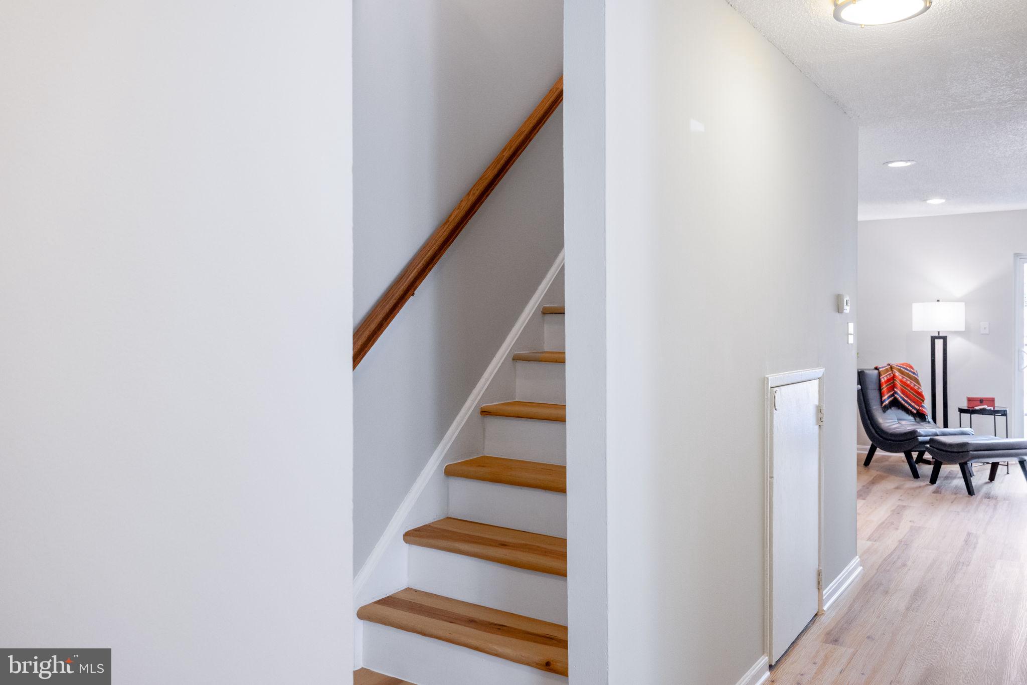 2389 Southgate Square Reston, VA 20191 - Photo 23 of 56 a view of entryway and hall with wooden floor