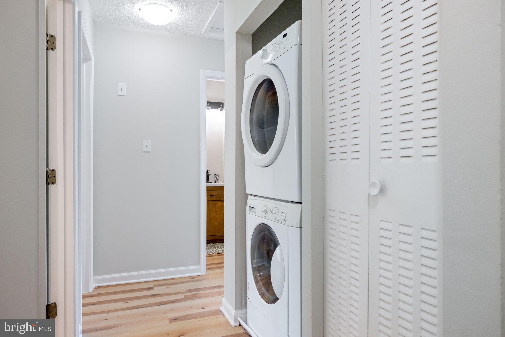 2389 Southgate Square Reston, VA 20191 - Photo 24 of 56 a utility room with dryer and washer