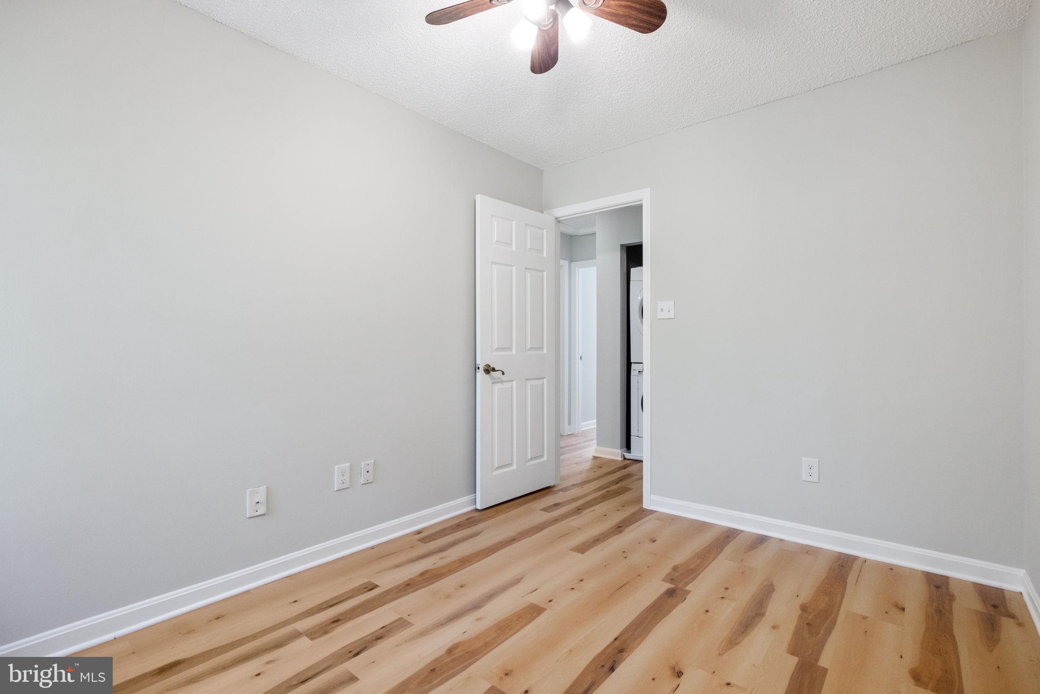 2389 Southgate Square Reston, VA 20191 - Photo 28 of 56 a view of room with wooden floor