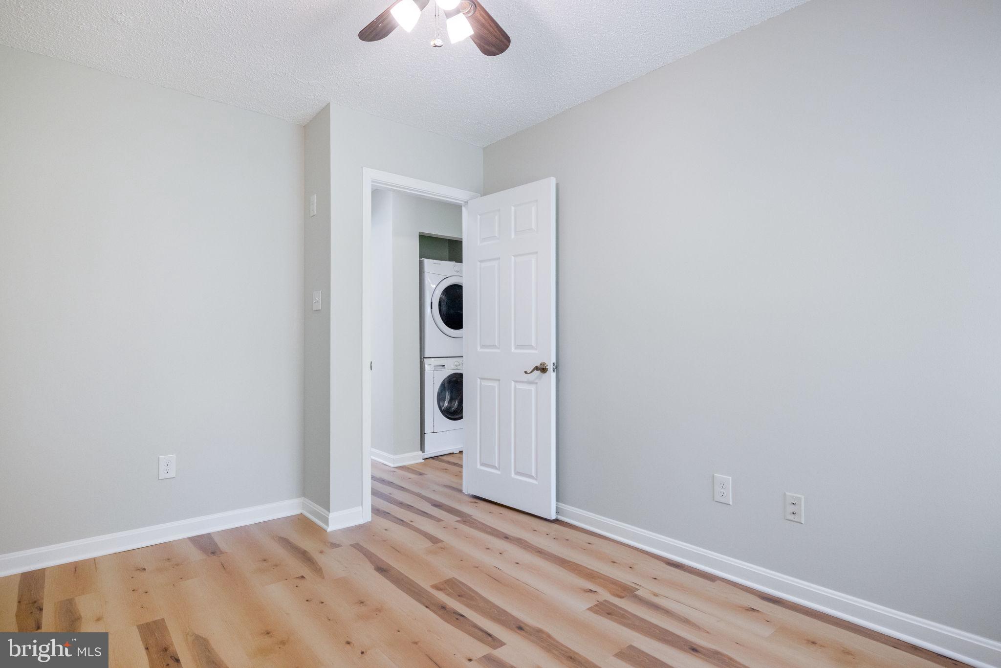 2389 Southgate Square Reston, VA 20191 - Photo 30 of 56 wooden floor in an empty room