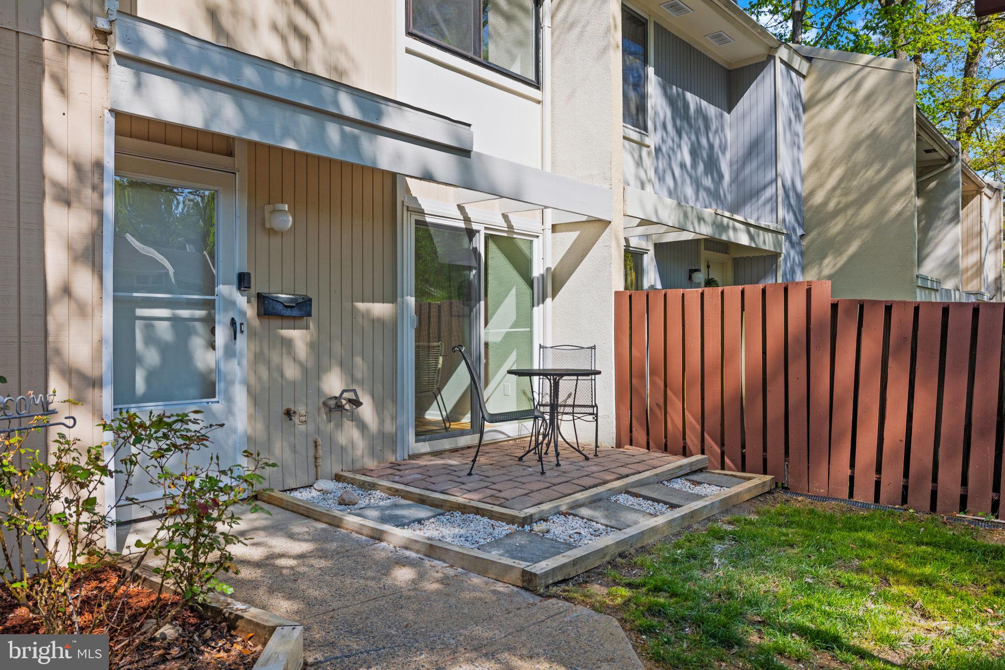 2389 Southgate Square Reston, VA 20191 - Photo 3 of 56 a view of a house with a backyard