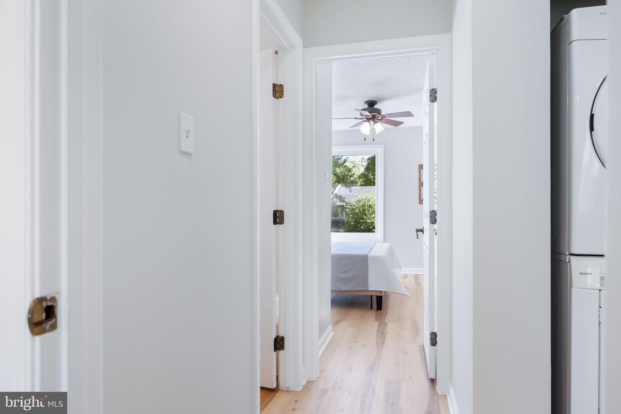 2389 Southgate Square Reston, VA 20191 - Photo 31 of 56 a view of a hallway with closet and a bathroom
